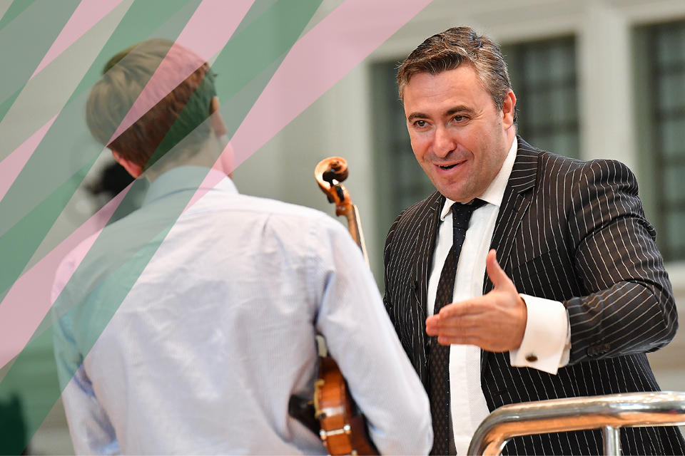 Maxim Vengerov working with a student during an orchestral masterclass